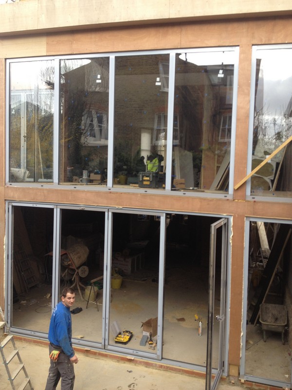 Aluminium bi-fold doors with two-storey glazing in Shoreditch