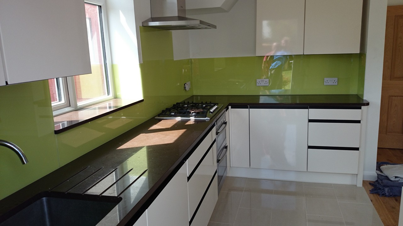 Lime green glass kitchen splashback installed by Shoreditch glaziers