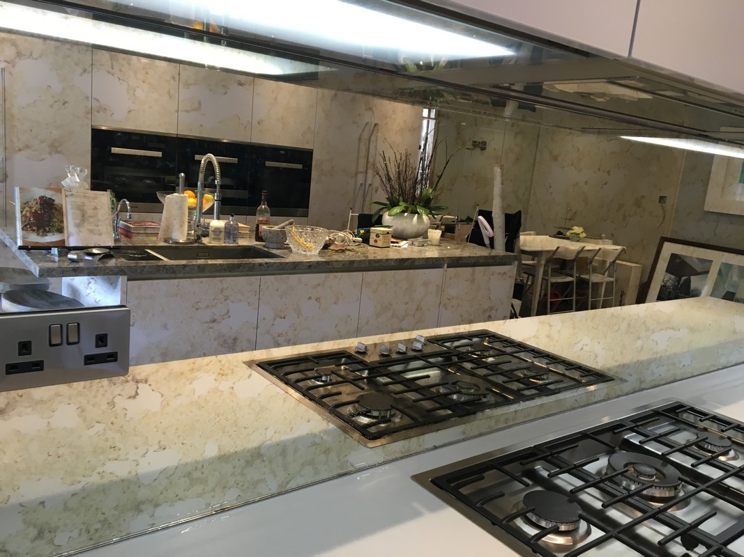 Mirror glass splashback in Shoreditch luxury kitchen